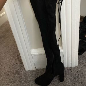 Thigh high black boots
